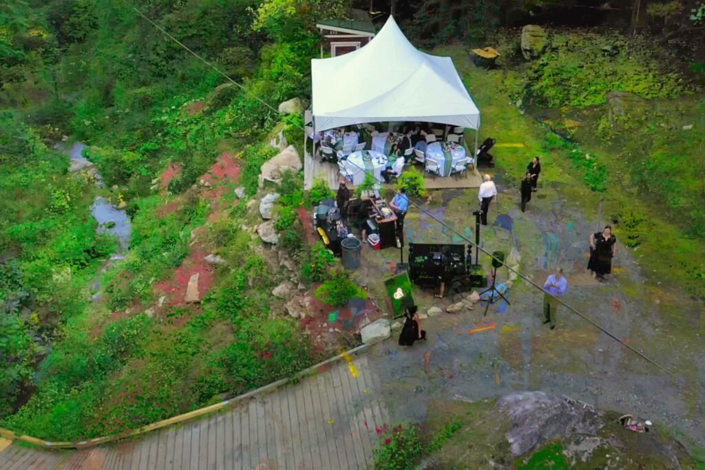 Intimate waterfall wedding venue in the North Carolina mountains featuring mossy rocks, natural streams, and private forest ceremony spaces at Weddings Over Waterfalls.